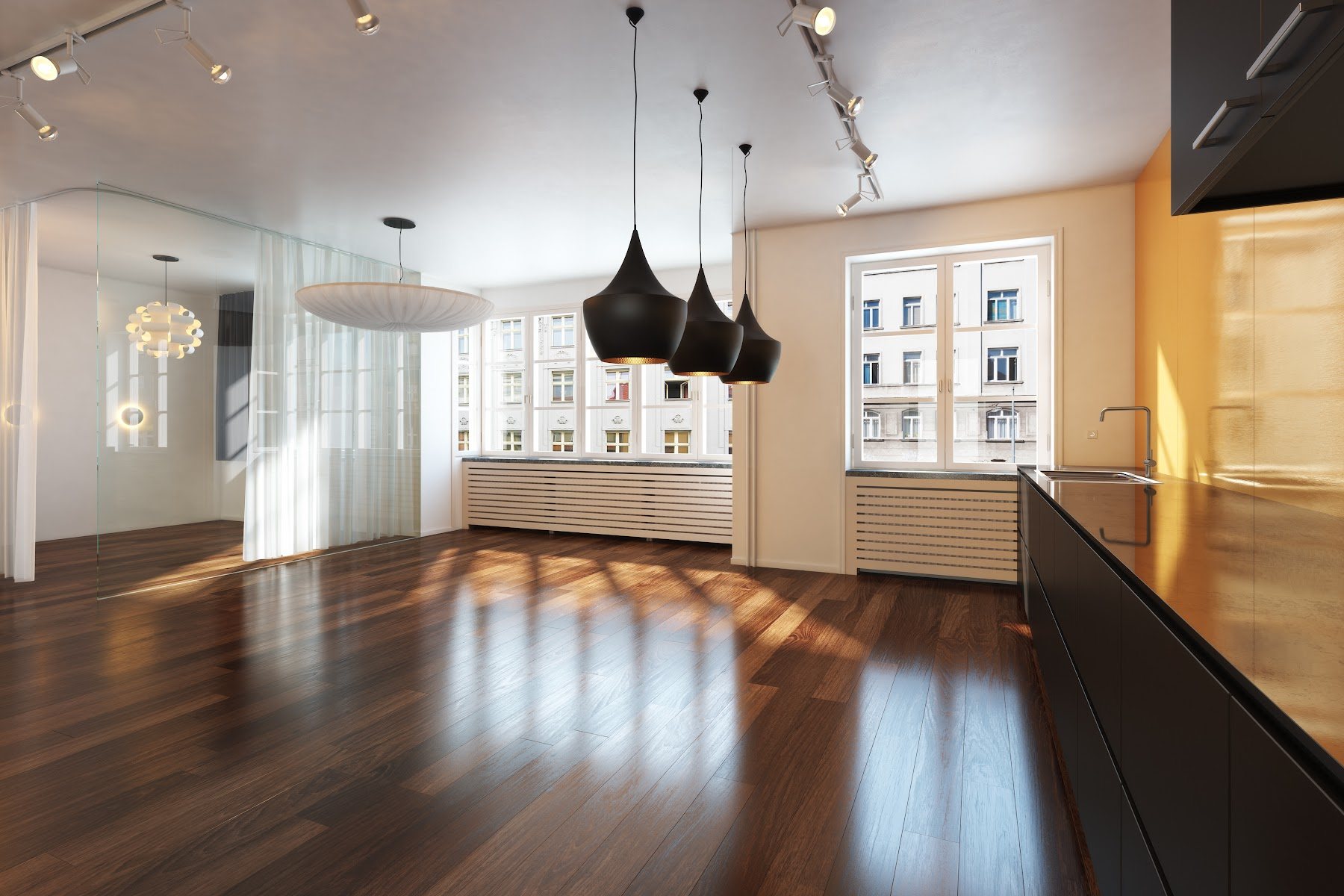 Polished dark wood flooring through a modern kitchen and dining area