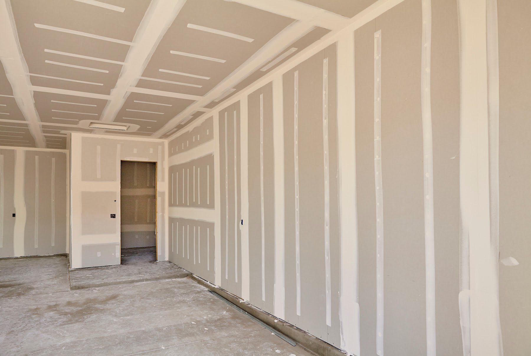 Interior room walls prepared for a coordinated paint finish
