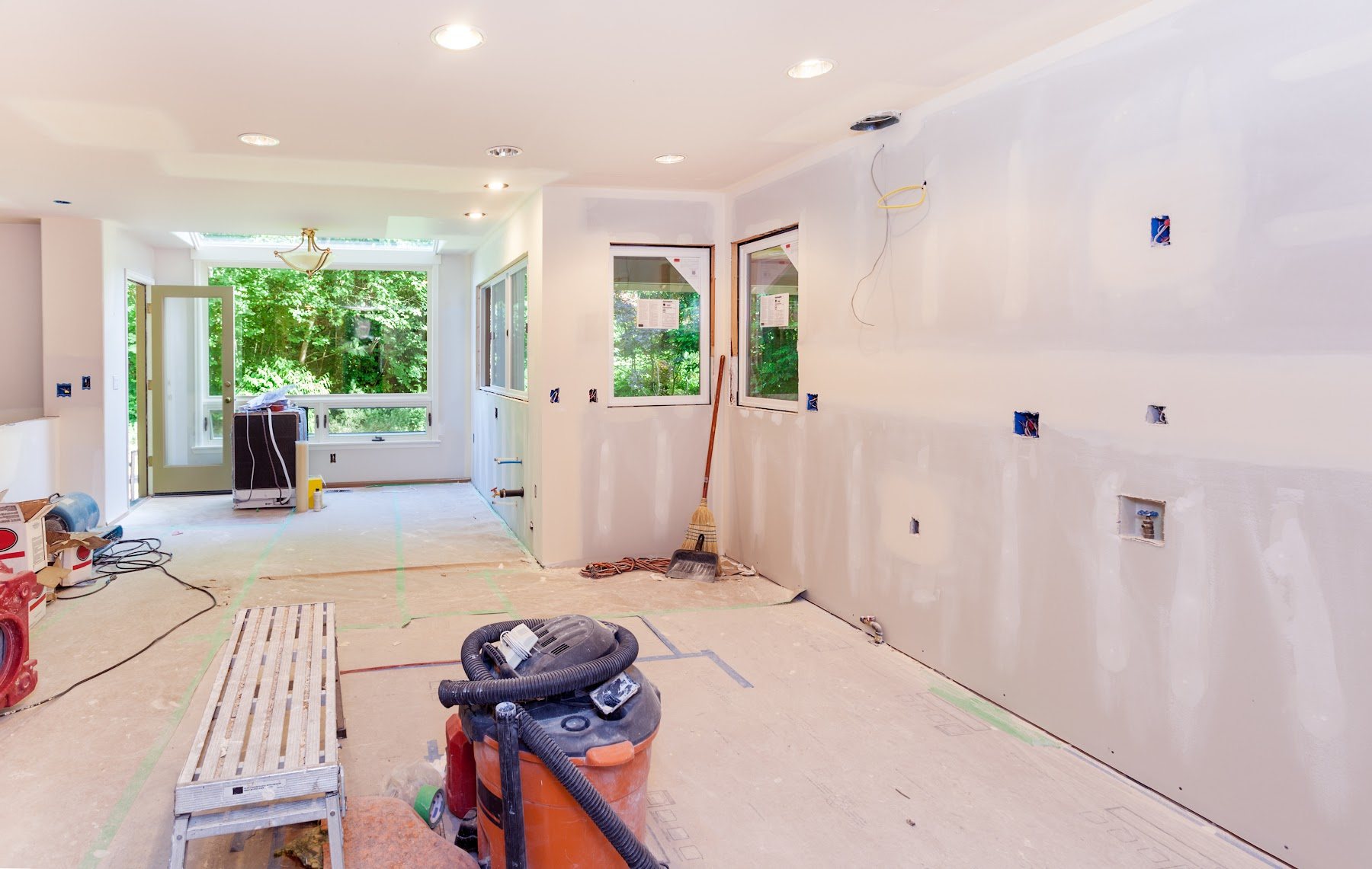 Interior room protected and prepared for finish painting