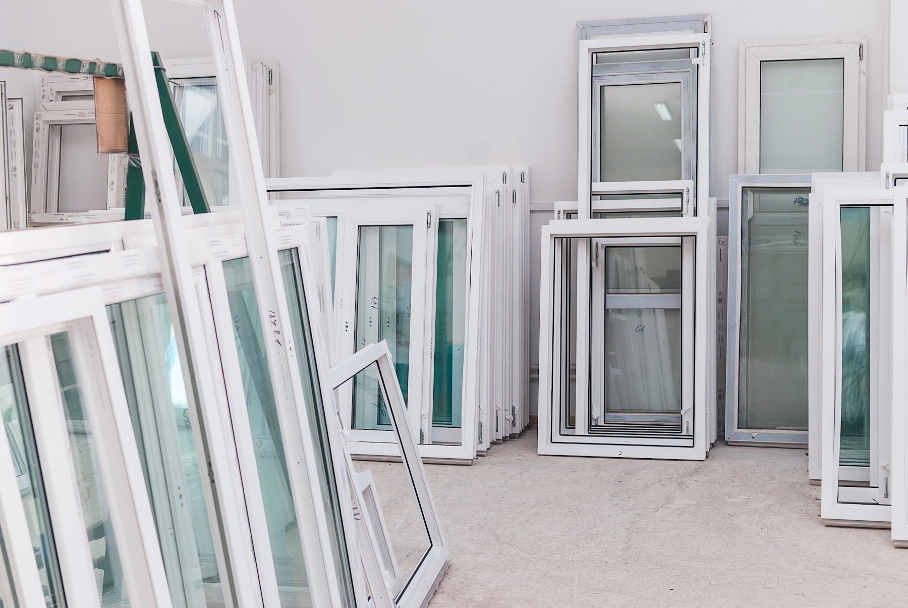 Assorted replacement window units prepared for installation